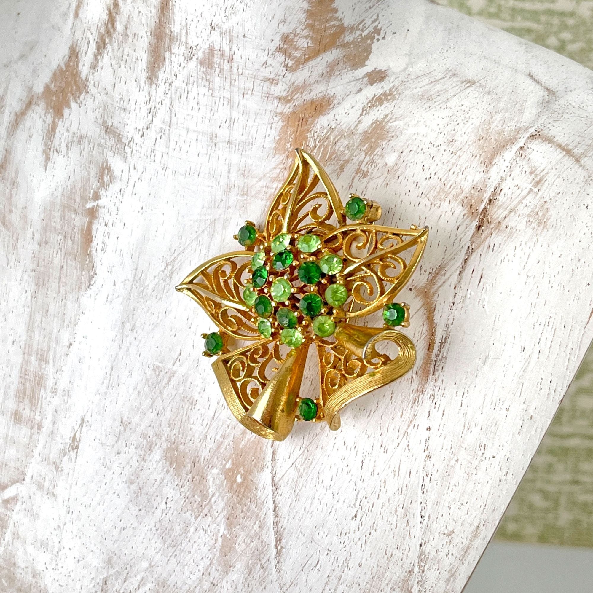 Gorgeous Lisner 1960s Filigree Green Rhinestone Christmas Brooch