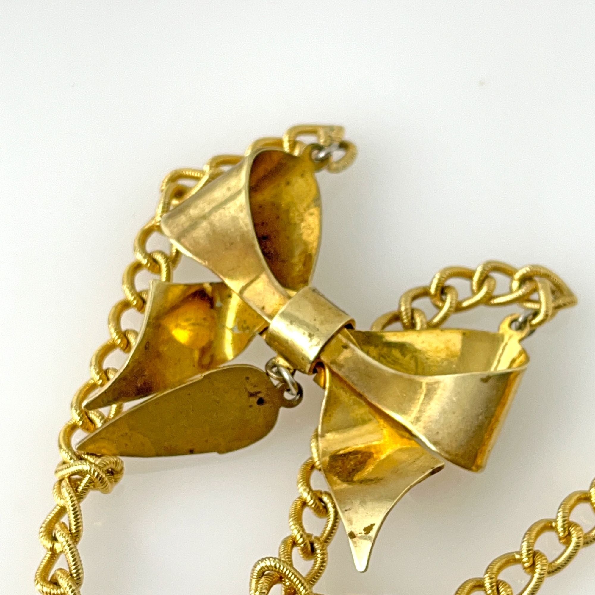 Charming Vintage 1930s Embossed Gold Tone Bow Necklace Art Deco