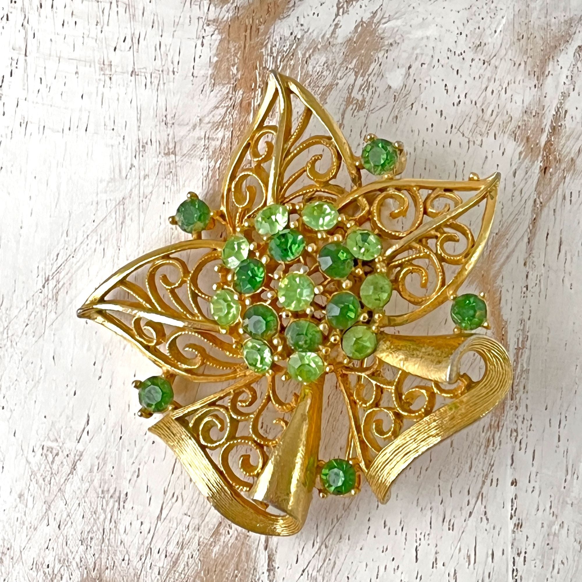 Gorgeous Lisner 1960s Filigree Green Rhinestone Christmas Brooch