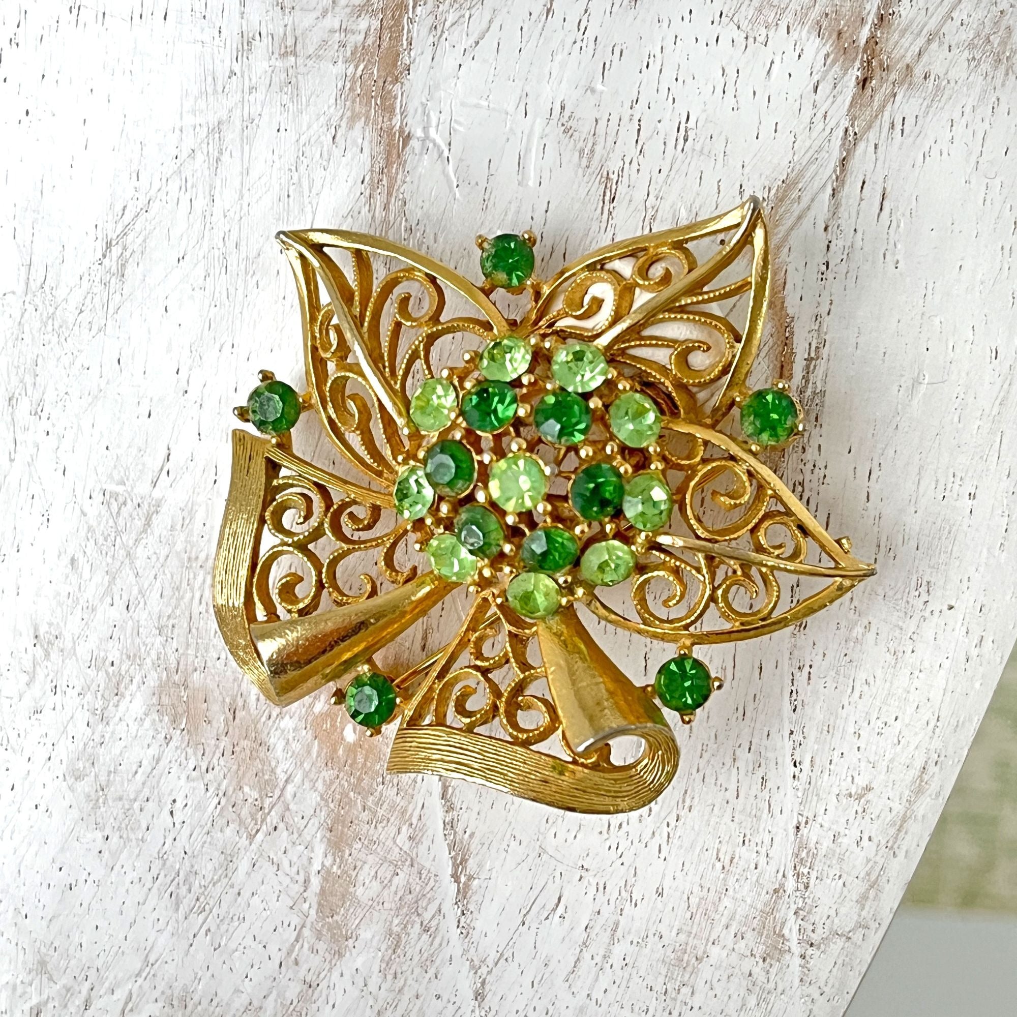 Gorgeous Lisner 1960s Filigree Green Rhinestone Christmas Brooch